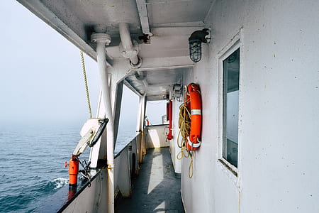red swim ring beside gray work light thumbnail