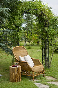 brown wicker armchair and end table thumbnail