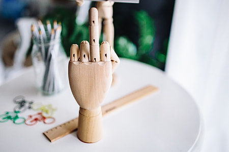 Wooden mannequin in various poses thumbnail