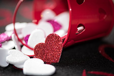 photo of bucket filled with white and red heart cutouts thumbnail