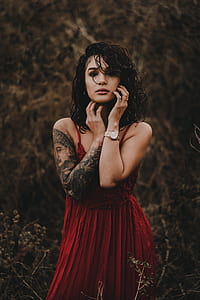 woman wearing red cami dress thumbnail
