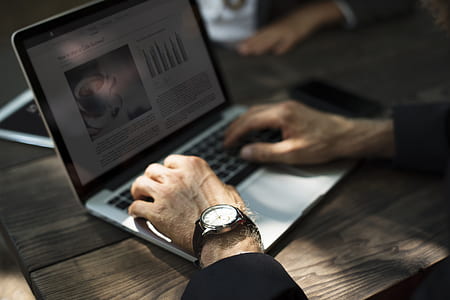 person using MacBook Pro thumbnail