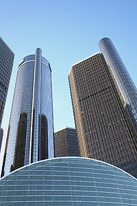 low-angle photo of high rise building during clear blue sky thumbnail