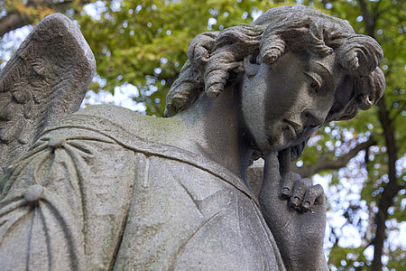 gray angel concrete statue thumbnail