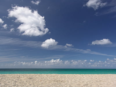 beach under white clouds thumbnail