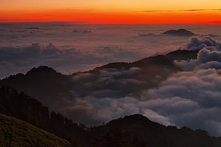 aerial photography of mountains covered with clouds thumbnail