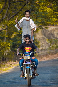 Two Men Riding a Standard Motorcycle thumbnail