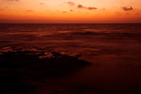 silhouette photo of rippling body of water thumbnail
