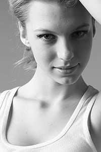 grayscale photo of woman thumbnail