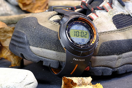 round black and yellow Protrek digital watch displaying 10:02 thumbnail
