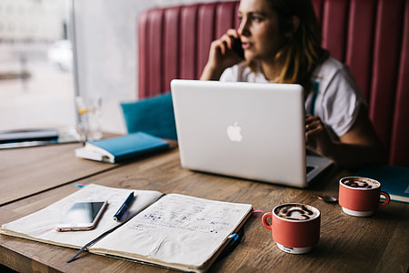Young woman working in a cafe thumbnail