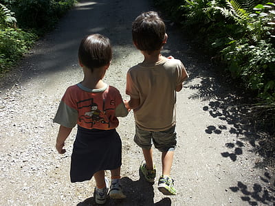 toddler's walking during daytime thumbnail