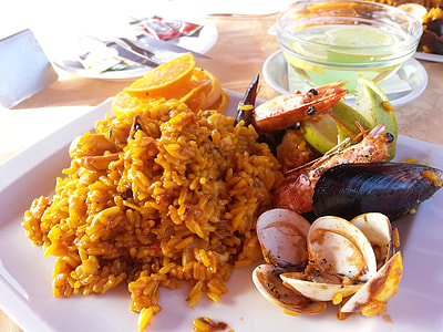 fried rice and cooked conch shells thumbnail
