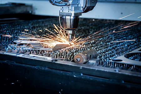 grey robotic arm welding with spark flying thumbnail