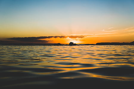 body of water during dawn thumbnail