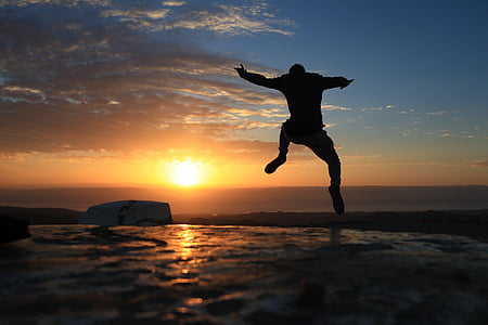 silhouette of man during daytime thumbnail