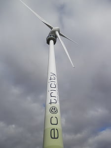 white tricity windmill under gray sky thumbnail