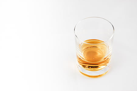 yellow liquid-filled clear drinking glass thumbnail