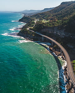 Elevated Highway Between Mountains and Shore thumbnail