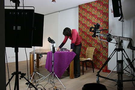 woman standing in front of table thumbnail
