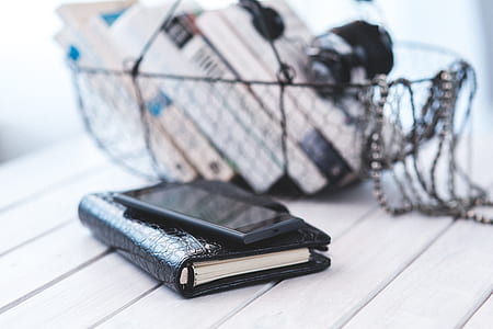 Elegant black notebook with mobile phone thumbnail