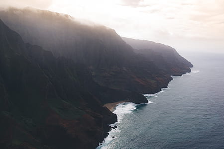 bird's-eye view of mountain and body wate thumbnail