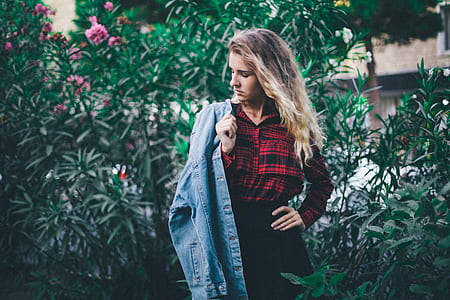 woman looking at her jacket thumbnail