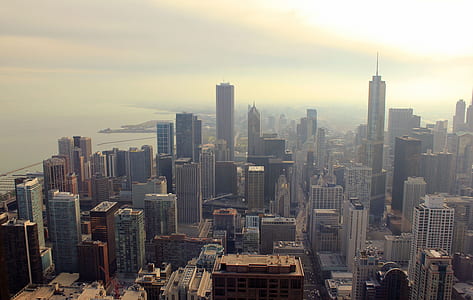 aerial view of city buildings during daytime thumbnail