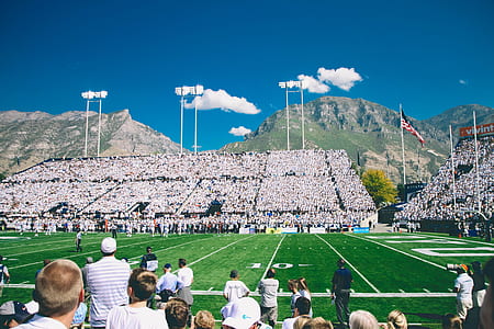 people on soccer field stadium at daytime thumbnail