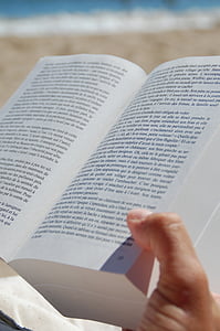 person reading opened book thumbnail