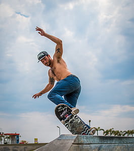 person playing skateboard on skate park thumbnail
