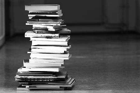 greyscale photography of book lot thumbnail