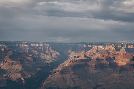 grand canyon under cloudy sky thumbnail