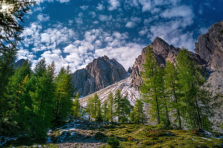 mountains under cloudy sky thumbnail