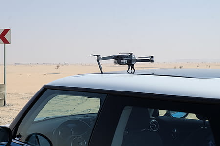 Photo of Drone On Top Of Car thumbnail
