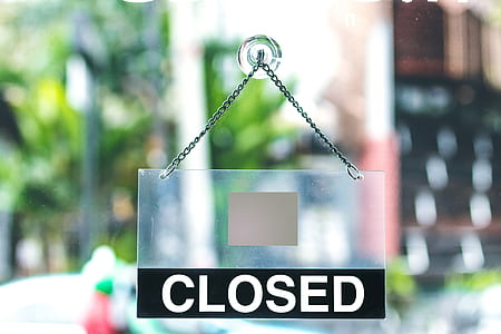 shallow focus photography of closed signage thumbnail