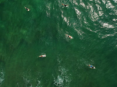 surfer on body of water thumbnail