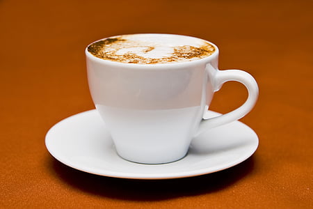 coffee in white ceramic cup on saucer thumbnail