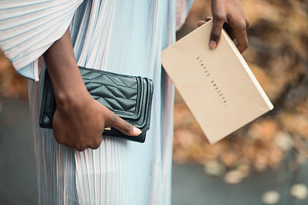 Person Holding Black Leather Wallet thumbnail