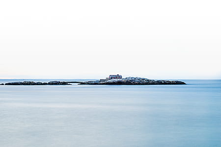 house on island at daytime thumbnail