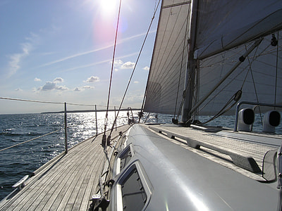 white sailboat sailing during daytime thumbnail