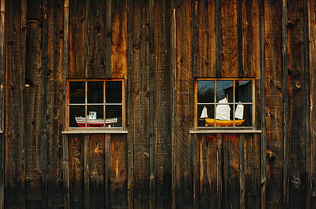 sail ship and cruise ship scale models on window thumbnail