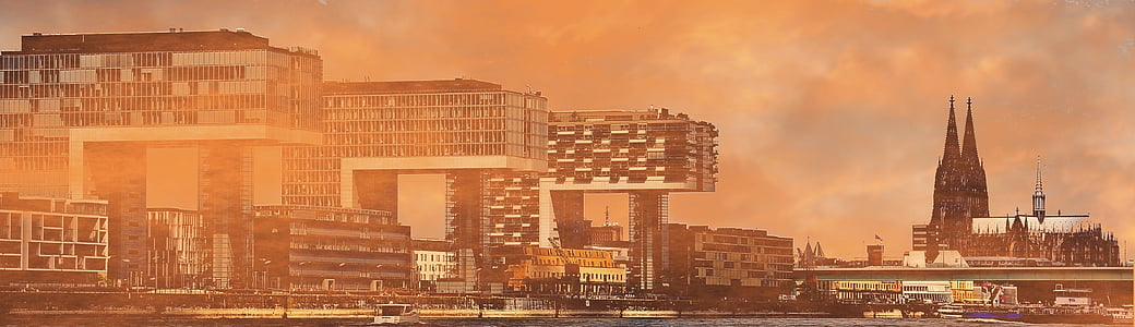 sepia photo of high rise buildings thumbnail