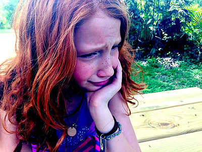 woman wearing purple top thumbnail
