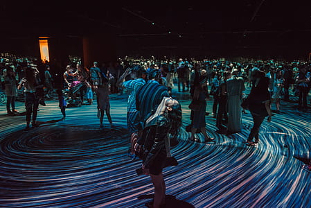 group of people walking during nighttime thumbnail