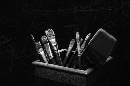 greyscale photo of paint brushes in box thumbnail