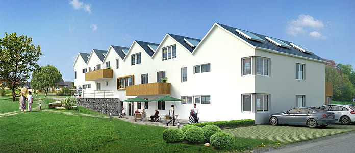 white concrete building surrounded by lawn grass thumbnail