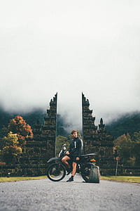 man sitting on motocross dirt bike thumbnail