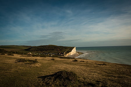 landscape photography of grass field thumbnail