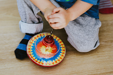 Child playing with toys on the floor thumbnail